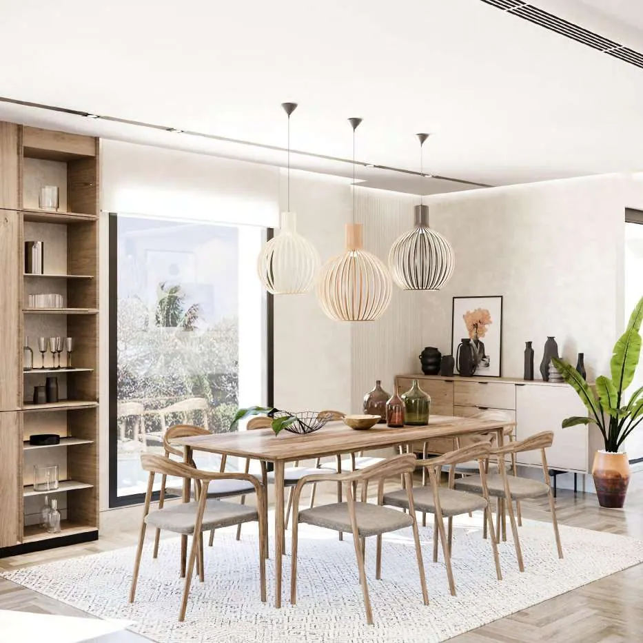 Dining room with wooden table and pendant lights