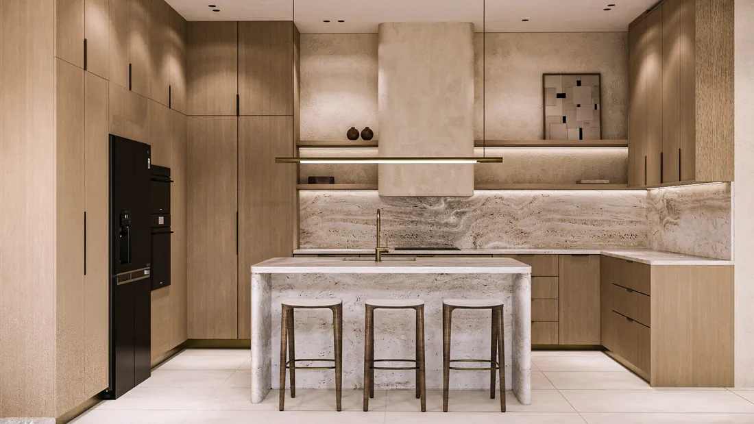 AK Home kitchen with oak cabinetry and travertine island, front view