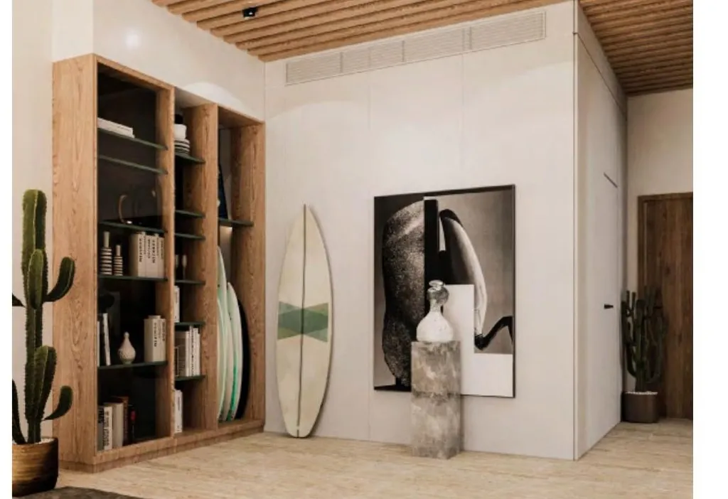 S Island Lounge built-in shelving with surfboard and art